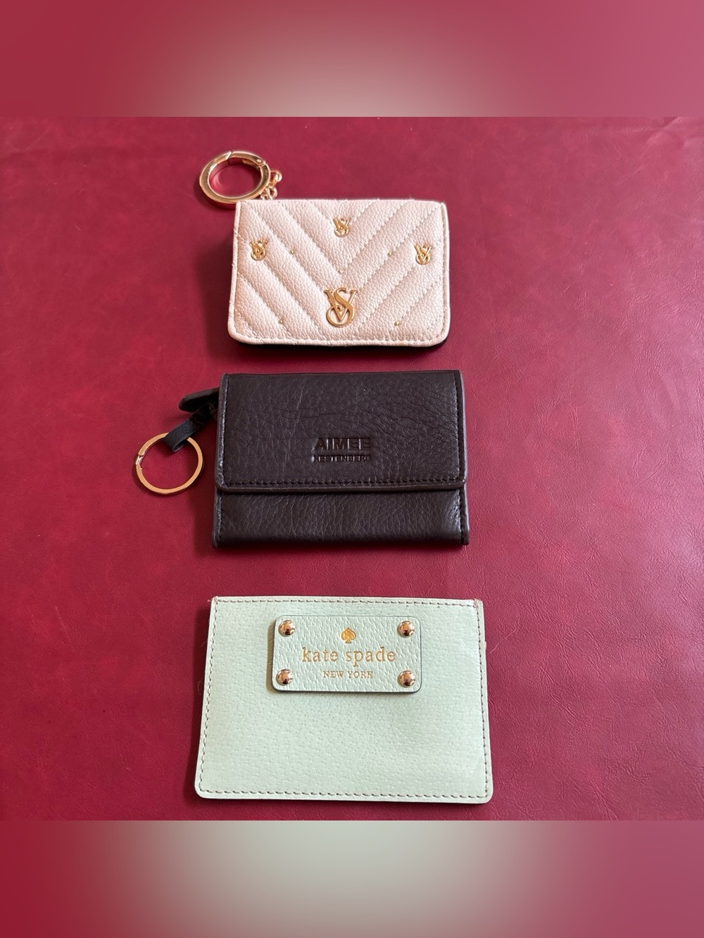 kate spade mint green leather card holder with gold-tone plaque